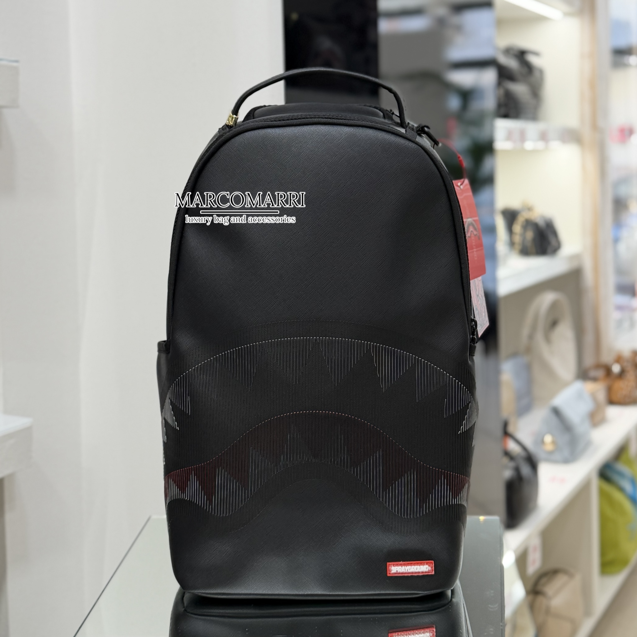 Sprayground zaino disappearing sherk Marco Marri negozio di borse e accessori Ponte San Giovanni, Perugia